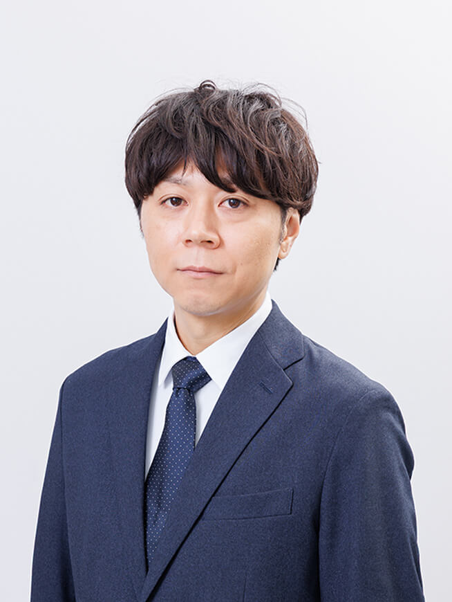 システム担当執行役員　久米 匡史